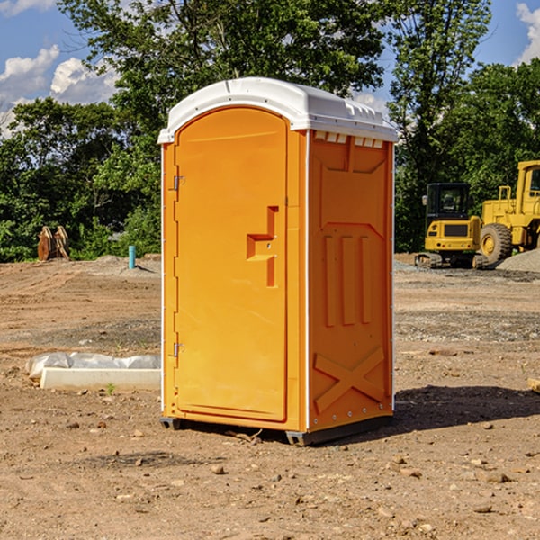 what is the cost difference between standard and deluxe portable restroom rentals in Spiceland